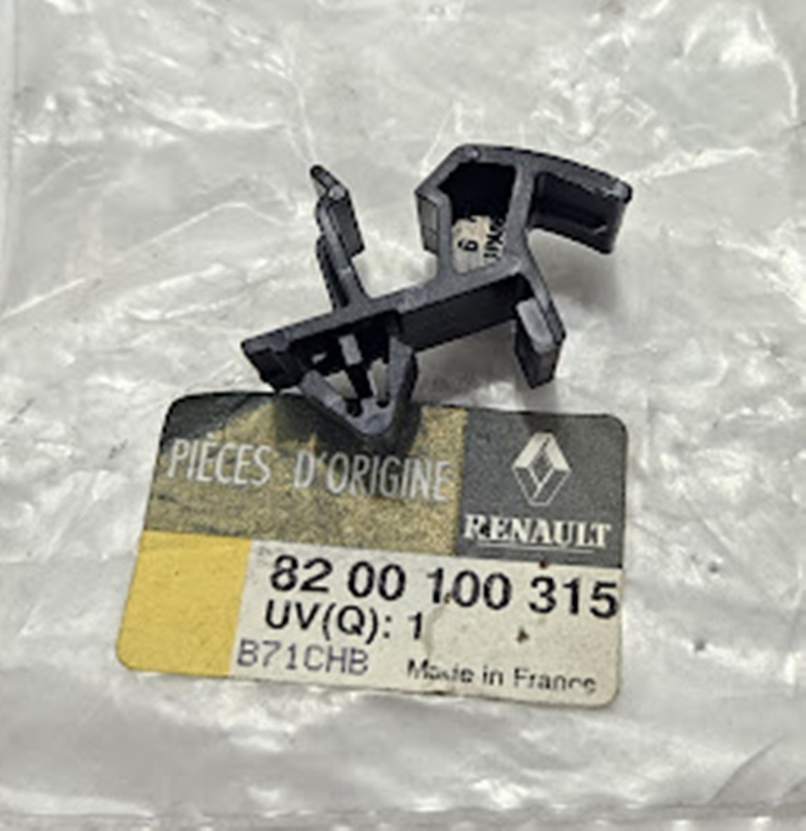 Presilha Plastica Guarnição Peitoral Renault Megane II - 8200100315